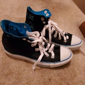 Black and blue converse high tops